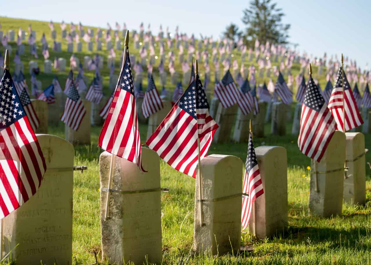 American flags on the graves of soldiers.