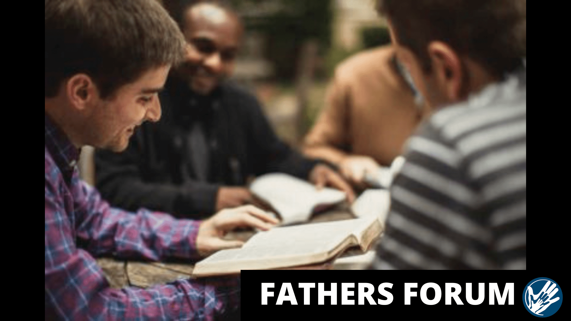 Small group of men gathered around a table with their Bibles opened. Words shown on bottom of image, "Fathers Forum".