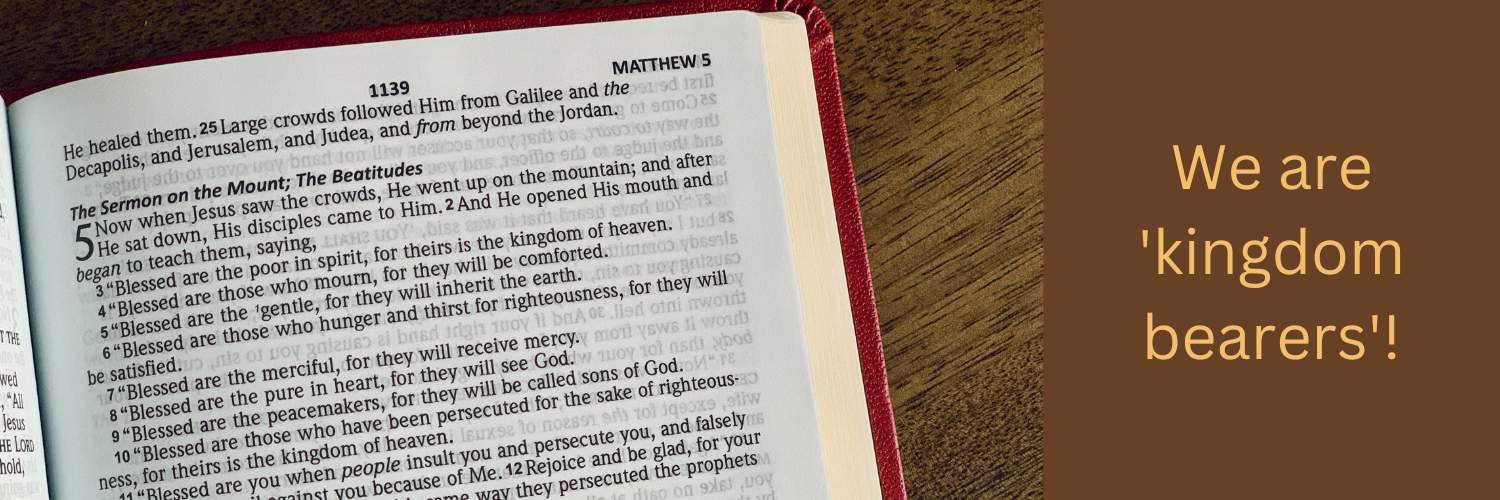 Bible opened to the Sermon on the Mount with a sentence next to it that says, "We are 'kingdom bearers'."
