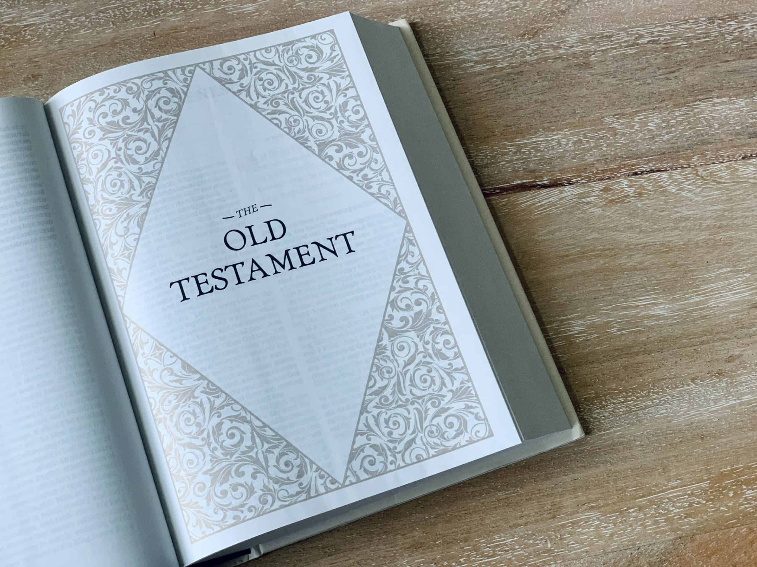 Bible opened to the Old Testament title page