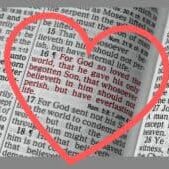 Bible opened to John 3:16 with a heart around that verse.