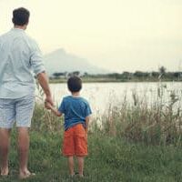 child-and-dad-watching-sunset-small-1