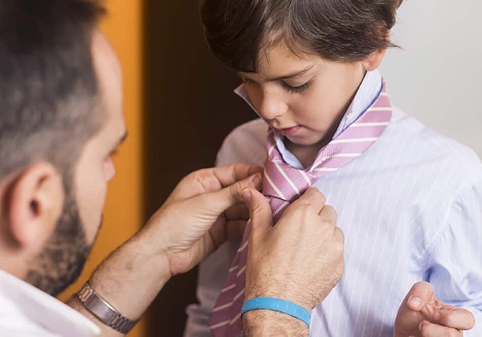 dad-and-son-tieing-tie-med