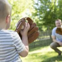 son-and-dad-playing-baseball